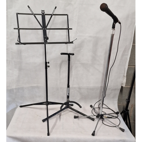 493 - Microphone Stand with Mic, Guitar Stand and a Music Stand . I think this is a really outSTANDing lot