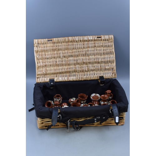 494 - Rattan Basket Containing a Large Selection of Cypriot Miniature Studio Pottery