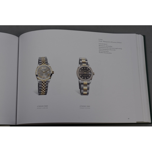 175 - A Rolex watch catalogue 2022/2023 and two Seiko watch boxes (empty)