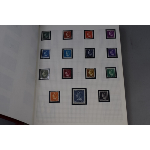 513 - Album Containing a Selection of Mint Stamps, includes Mauritius, Gambia, Gibraltar, Kiribait and mor... 