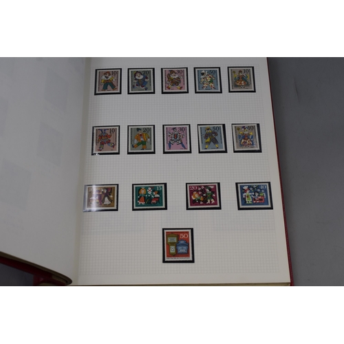 513 - Album Containing a Selection of Mint Stamps, includes Mauritius, Gambia, Gibraltar, Kiribait and mor... 