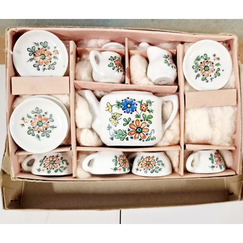 525 - Two Childs Tea Sets In Original Boxes. One Saucer in The Largerc Set has a Small Chip.