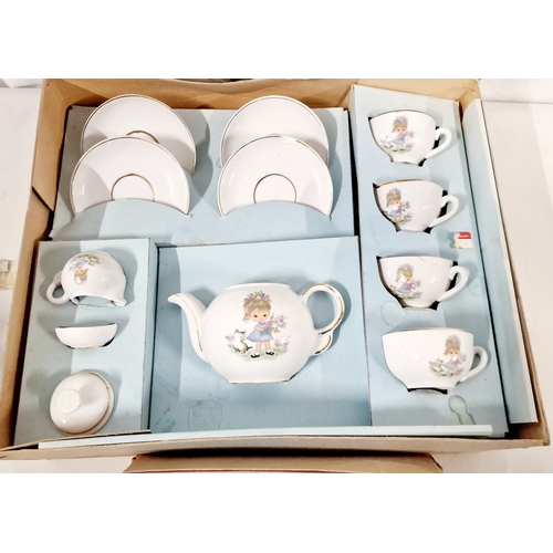 525 - Two Childs Tea Sets In Original Boxes. One Saucer in The Largerc Set has a Small Chip.