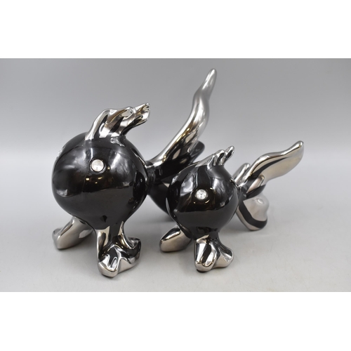 211 - Two Black and Silver Puffer Fish Ornaments (Largest 10