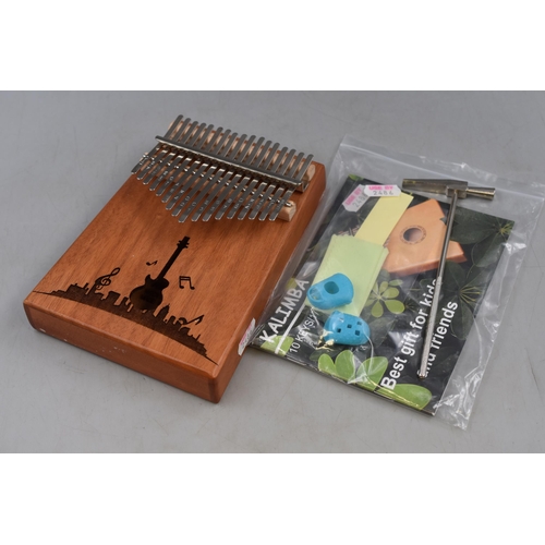 212 - Kalimba 17 Keys Thumb Piano complete with accessories and instruction manual