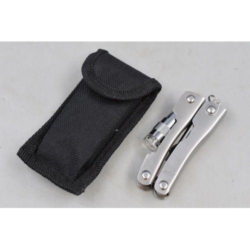 235 - New Pocket Sized Multitool with Torch and Case