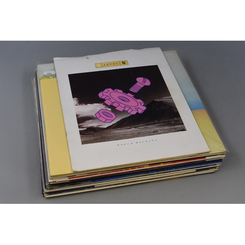 568 - A Selection of Level 42 Vinyls (LP's and Singles) and A Tour Programme. Includes World Machine, Runn... 