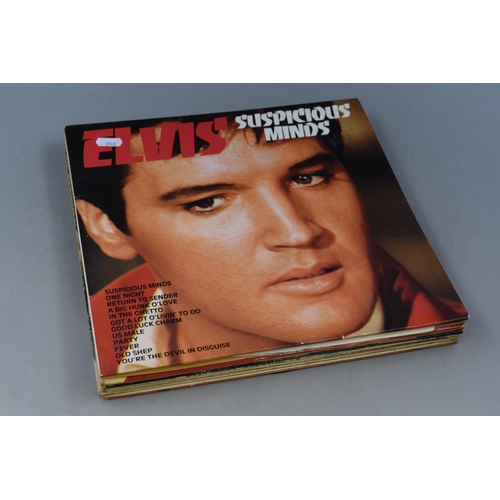 570 - A Selection of Seven Elvis Presley Vinyl LP's. To Include Christmas Album, Suspicious Minds, And Mor... 