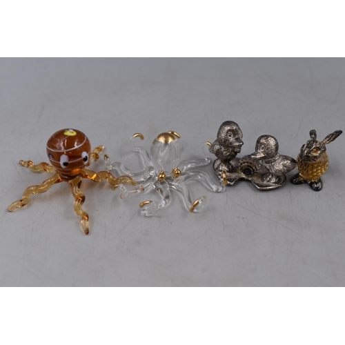 256 - Two WAPW Pewter and Crystal Figures, and two Octopi