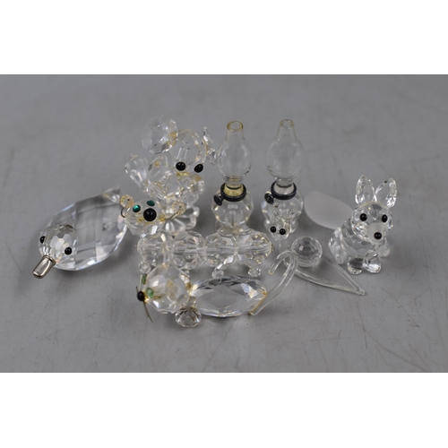 259 - Selection of Swarovski Crystal Animal Figures and a Pair of Oil Lamps