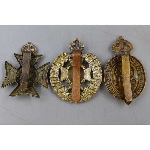 279 - Three Military Cap Badges to include British Army Tower Hamlets Rifle Brigade, Royal Engineers and B... 