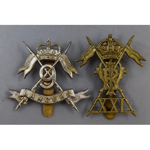 284 - Two Military Cap Badges to include XXI (21st) Empress of India Lancers and 9th Lancers