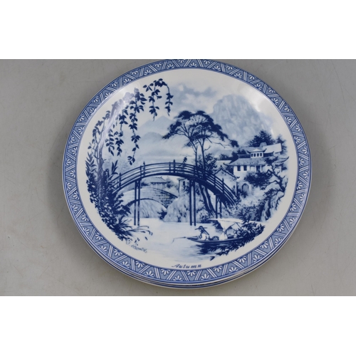 322 - Four Oriental Blue and White Decorative Plates, Depicts The Four Seasons. Approx 9.5” Diameter