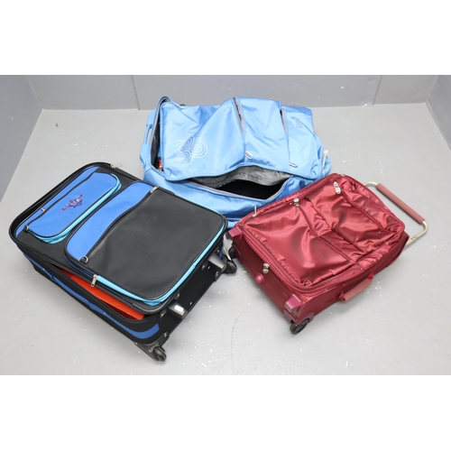 927 - Three Suitcases to include various items. Includes Approx. 25 Gift Bags, Christmas items, Cordless P... 