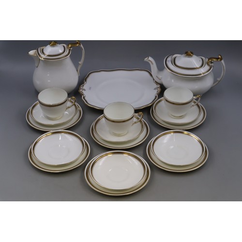 424 - Paragon Fine Bone China Tea pot and Coffee pot. Comes with 3 Trios, Sandwich Plate, 3 saucers and 3 ... 