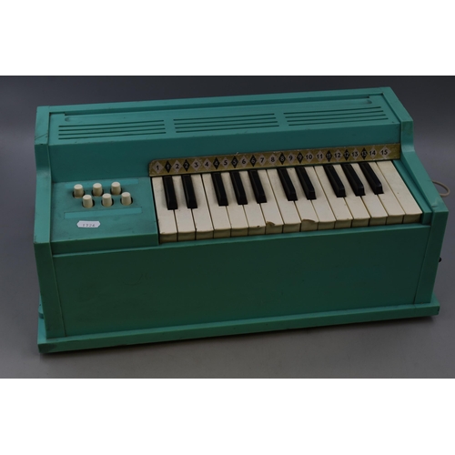 667 - A Retro Electric Organ, In Turquoise. Powers on When Tested but AF