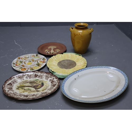 679 - Mixed Lot of Ceramics to include Serving platters, Urn, Wall Display plates and more