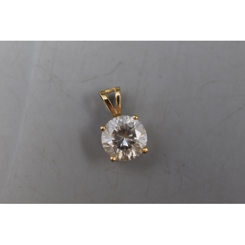 26 - A 14ct Gold Clear Stoned Pendant