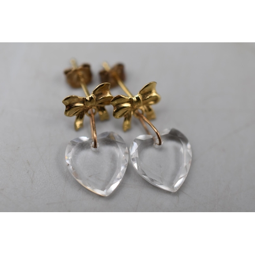 39 - A Pair of 9ct Gold Clear Loveheart and Bow Earrings