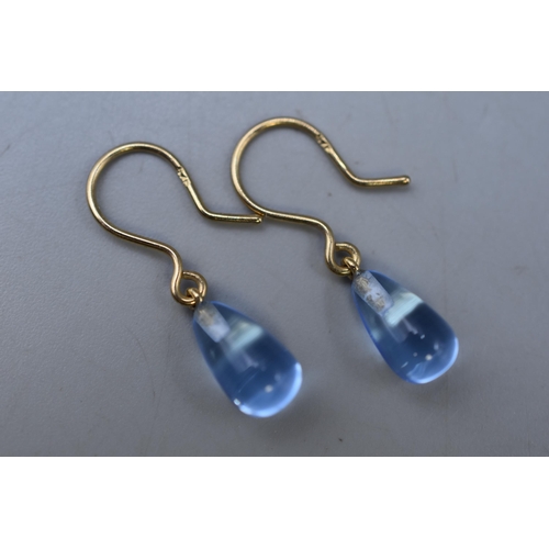 42 - A Pair of 9ct Gold Blue Stoned Drop Earrings