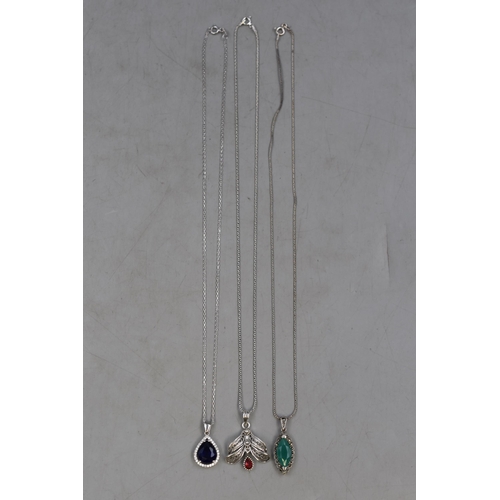 66 - Three Silver 925 Pendant Necklaces, includes Green Stoned Marcasite Design, Blue Stoned Tear Drop an... 