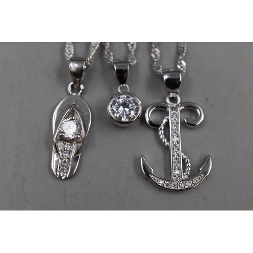 77 - Three Silver 925 Pendant Necklaces to include Anchor Style, Flip Flop and Round Stone Design