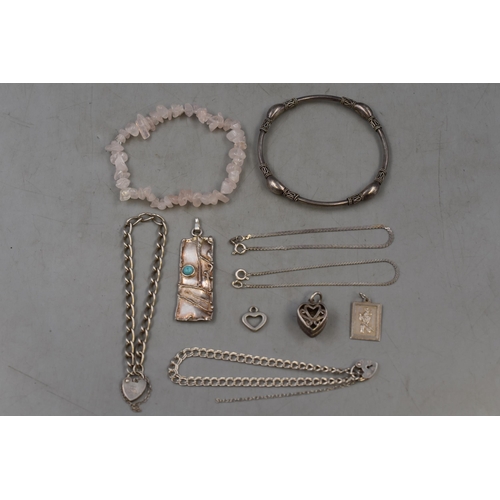 78 - A Selection of Jewellery To Include 925. Silver Bangle, Four 925. Silver Bracelet Chains, Four Penda... 