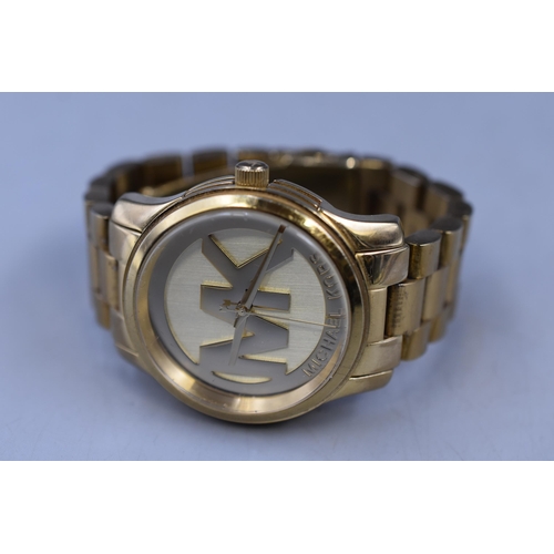 81 - A Gold Tone Michael Kors Watch, Working