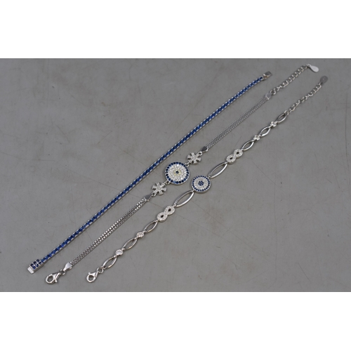 93 - Three Silver 925 Bracelets each with Diamanté Blue Stone Design