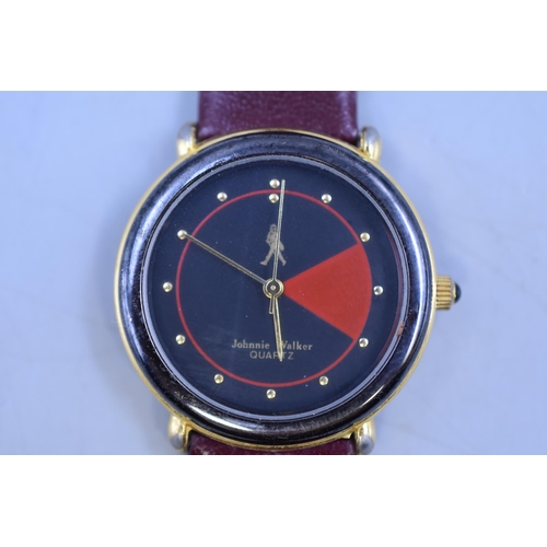 112 - A Johnnie Walker Quartz Watch, With Red Leather Strap. Working