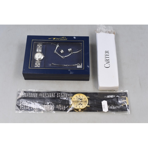 124 - Three watches one Amelia Carter gents, one gold with black strap featuring English coat of arms, and... 