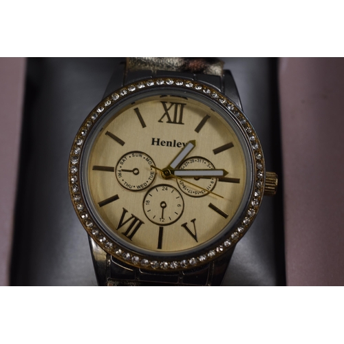 129 - Henley ladies watch in gold with animal print strap in presentation box