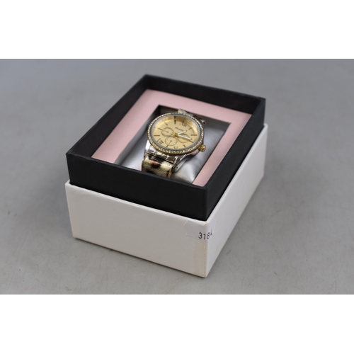 129 - Henley ladies watch in gold with animal print strap in presentation box