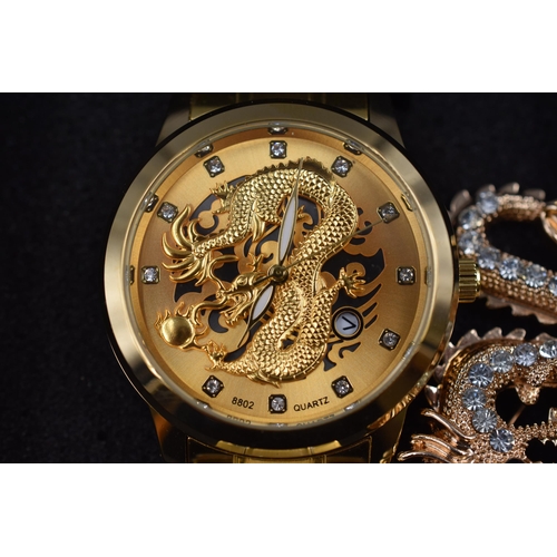 130 - Gents dragon style watch in gold with dragon brooch new unused in presentation box