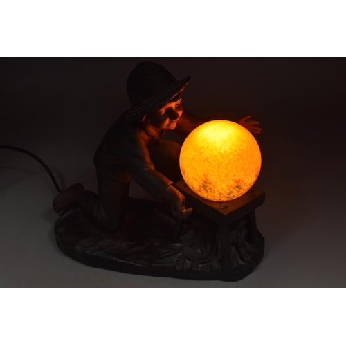 395 - Vintage Signed De Raneiri Lamp of a Small Boy with Orange Glass Globe fitted with lazy Switch workin... 