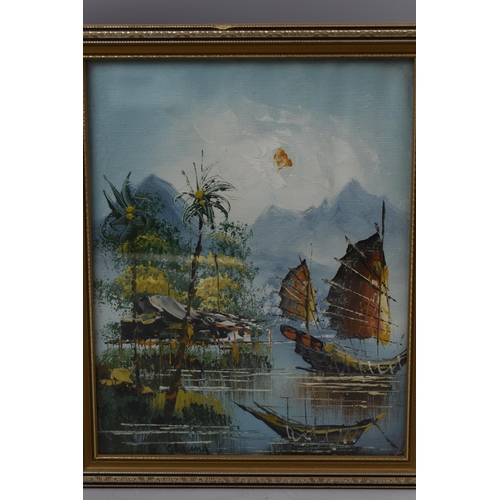 427 - Two Oriental Oil on Board Paintings of River Scenes in Framed and Glazed Mounts