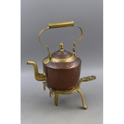 436 - Copper and brass kettle with an Adjustable Brass Trivet