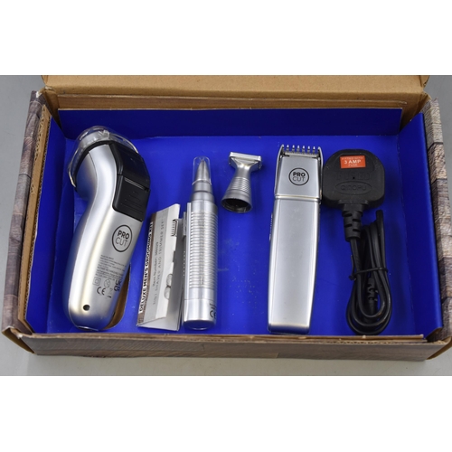 482 - Boxed Deluxe Men's Grooming Kit, includes Shaver, Hair Trimmer, Sideburn Trimmer and Nose and Ear Tr... 