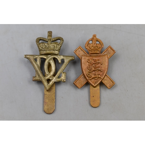 296 - The Fifth Royal Inniskilling Dragoons and The Royal Jersey Light Infantry Cap Badges