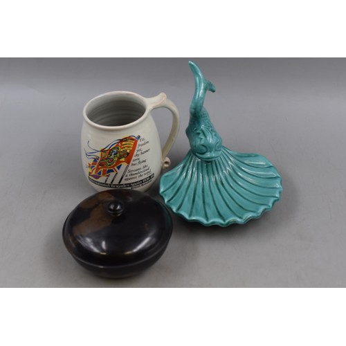 311 - Bakelite Lidded Pot, Spanish Civil War (1936-39) Mug, and a Studio Pottery Fish Dish