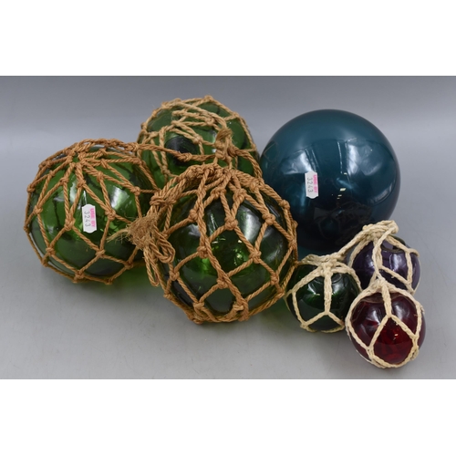 321 - Collection of netted Glass Balls plus one un-netted