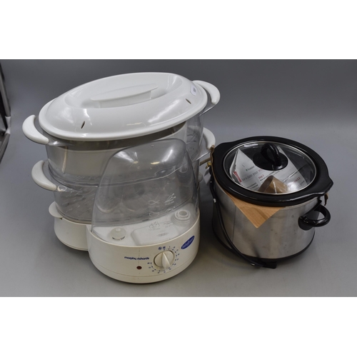 592 - Two Unused items to include Small Daewoo Slow Cooker and a Morphy Richards Steamer (Both Power on)