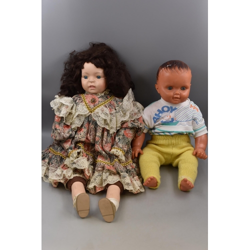 637 - Two items to include Large Vintage Porcelain Doll and a Mid Century Toy Baby