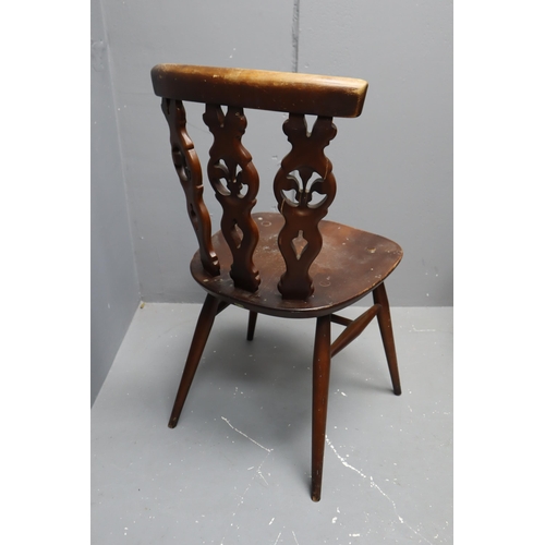 674 - A Set of Four Ercol Wheel Backed Wooden Dining Chairs, Approx 31.5