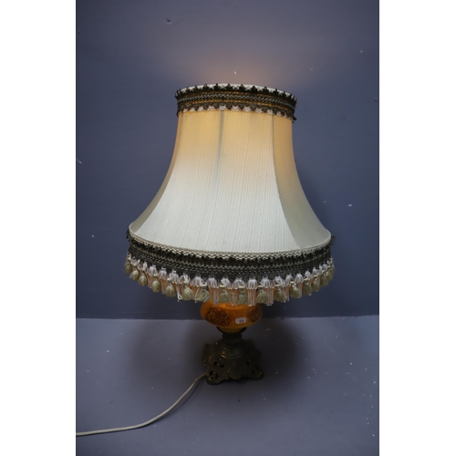 687 - Two Table Lamps with Shades, includes Vintage Art Nouveau Lamp with yellow Ceramic Design and a Bras... 