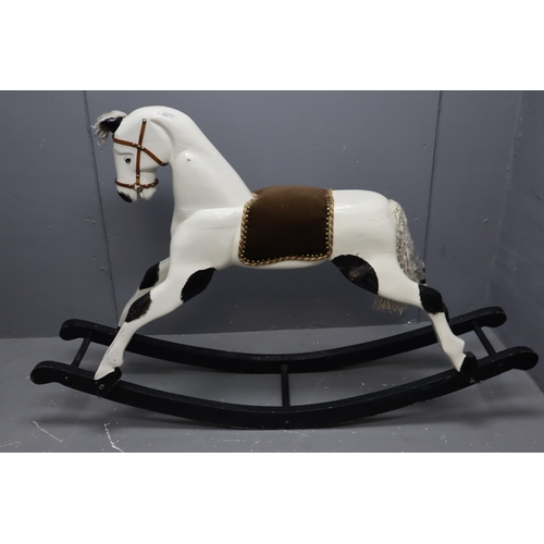 704 - Large Solid Wood Hand Made Vintage Rocking Horse in nice sturdy condition with a Copper plaque under... 