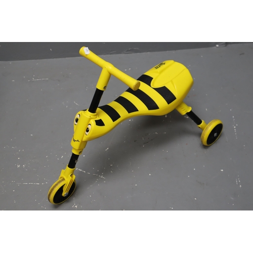 722 - Two items to include Bee Rocker and a Scuttle Bug Bike