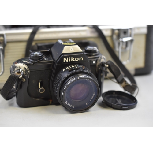 795 - Nikon EM SLR Camera with 50mm Lens, Accessories and Case