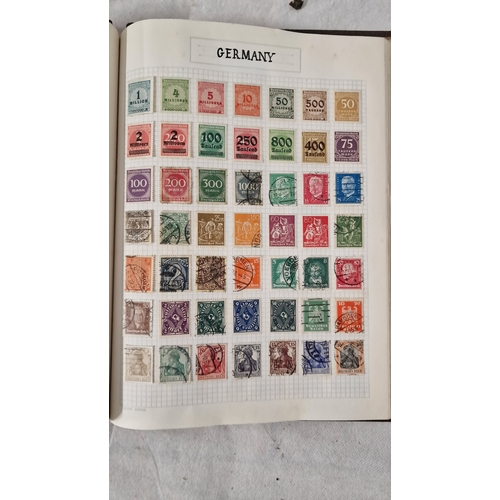 497A - Harold Stroud Globe Super Stamp Album Full of Stamps and Another Album With More Stamps in It.