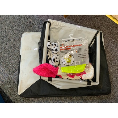 825 - A Selection of Dog Accessories To Include Dog Car Seat, Dog Jackets, Hi Vis and A Ancol Dog Travel P... 